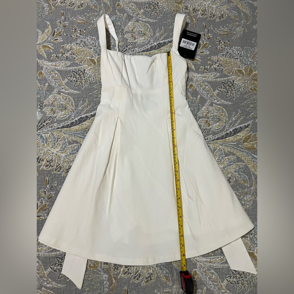 Chic White Sleeveless Mini Dress - Picture 14 of 16